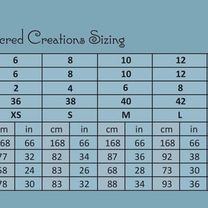 May include: A size chart from Sacred Creations, with measurements in both centimeters and inches. The chart includes sizes for AU, UK, USA, EUR, and ALPHA, with corresponding measurements for height, bust, waist, and hip.