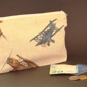 Beige Reißverschlusstasche mit Flugzeugen