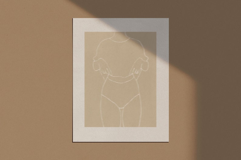 May include: A minimalist line drawing of a person in a simple outfit, printed on a beige background. The image is framed with a white border.