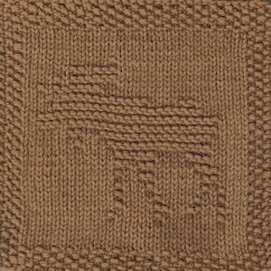 May include: A brown knitted dishcloth with a textured pattern. The dishcloth is made of cotton and is designed to be durable and absorbent.