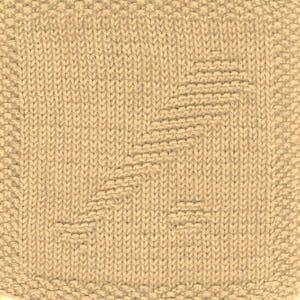 May include: A beige knitted dishcloth with a geometric pattern. The pattern is created by alternating knit and purl stitches.