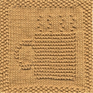 May include: A brown knitted dishcloth with a geometric pattern. The pattern is made up of squares and rectangles.