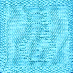 May include: A blue knitted dishcloth with a simple geometric pattern.