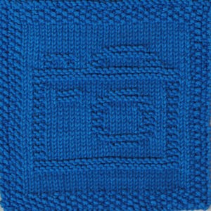 Puede incluir: Un paño de cocina de punto azul con un patrón texturizado.