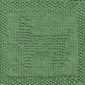May include: A green knitted dishcloth with a woven pattern.