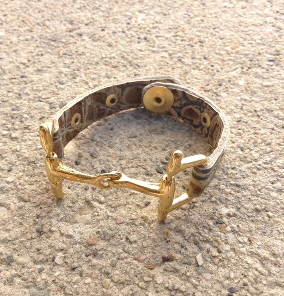 Items similar to Leather bracelet with gold hardware. Inside measures 6