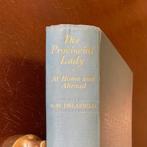 PROVINCIAL LADY At Home and Abroad by E. M. Delafield.  Delightfully Witty, The Bridget Jones of the 1930s. First Edition Published 1935