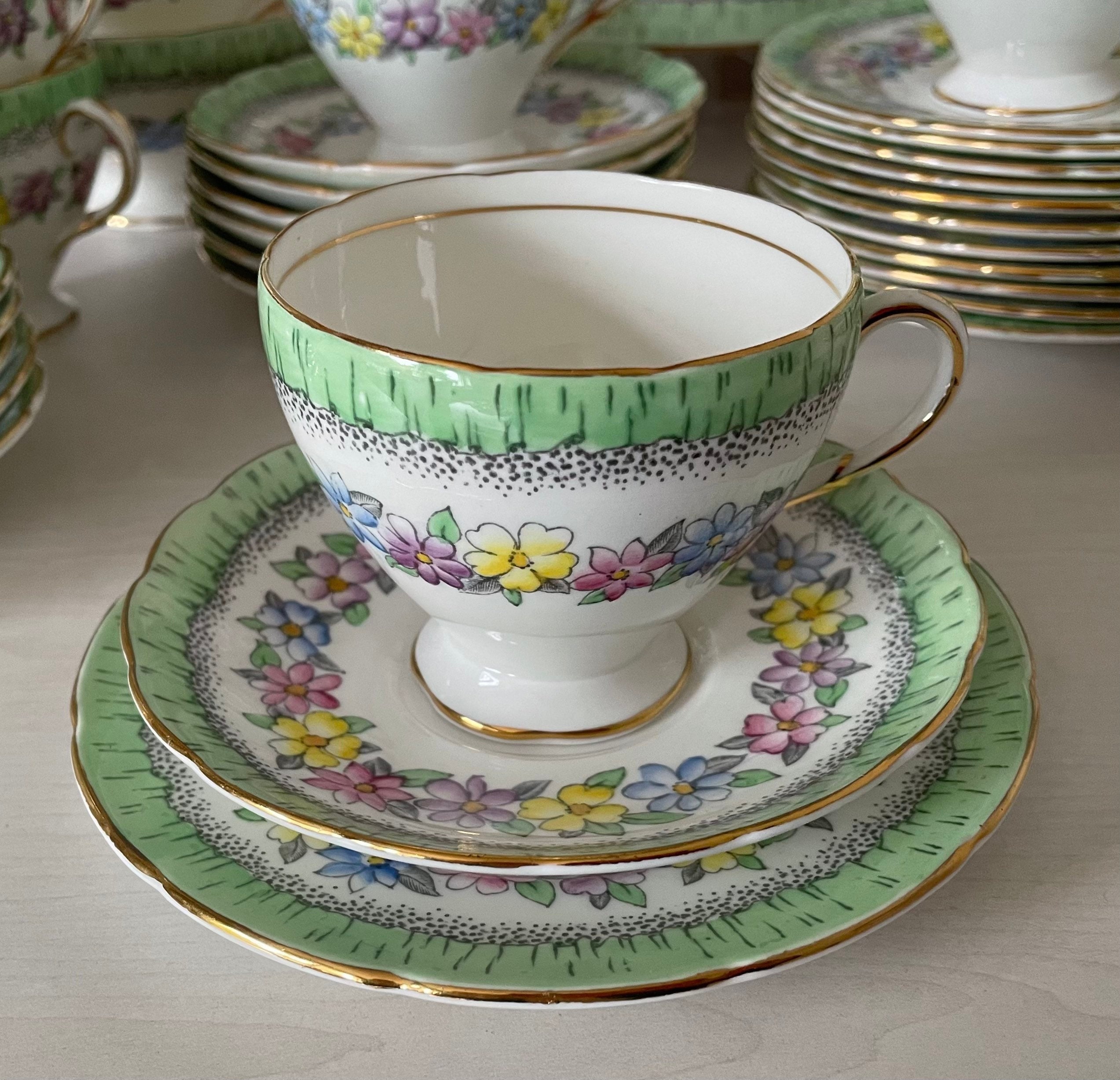 Foley Vintage Bone China Trio, Cup, Saucer and Plate. Partially Hand-Painted Floral Pattern, Green Border on White Background