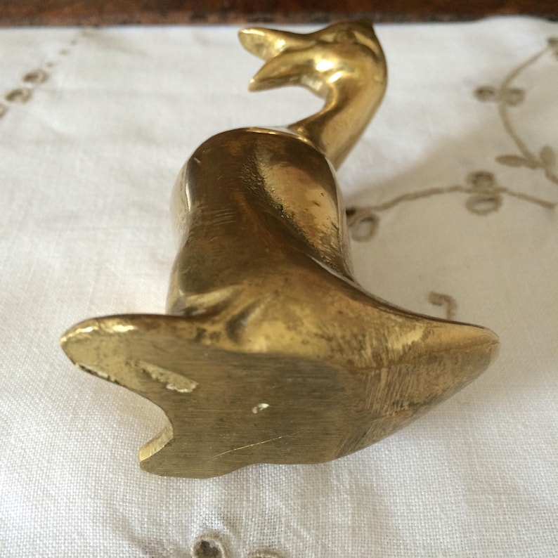 solid brass duck figurines