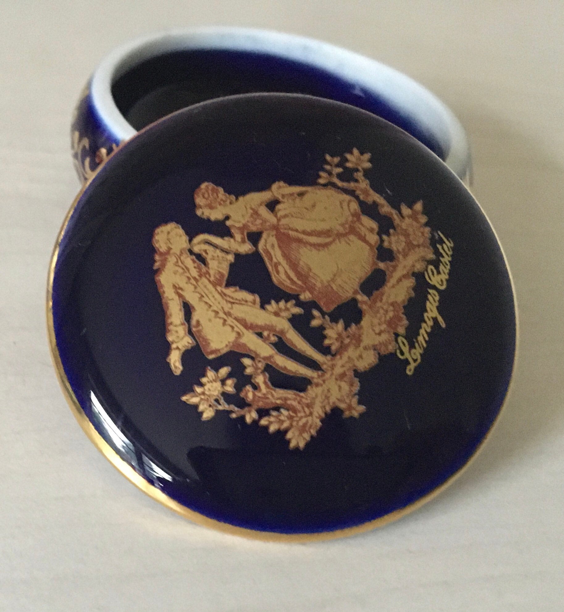 Limoges Castel France 22K Gold and Cobalt Blue Hand Painted Lidded  Fragonard Courting Couple Pill Box. Made in France and very Collectable!
