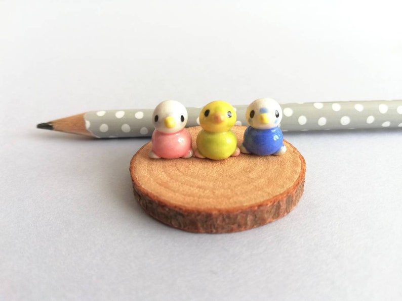 Miniature budgie ornament. Pottery birds on little wood base image 1