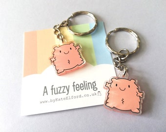 A fuzzy feeling keyring, cute happy, love, positive key fob, friendship, support, care, recycled acrylic