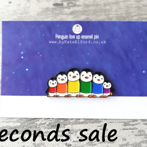 Seconds. Rainbow penguin soft enamel pin, penguin brooch. Penguin line up badge