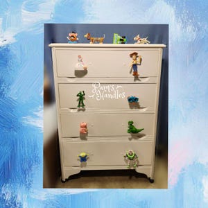 Juego de 12 tiradores de cajón grandes de Toy Story con el Sr. Cabeza de Papa.