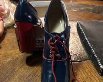 Vintage 1970's red, and blue platform tie up shoes size 6 1/2B