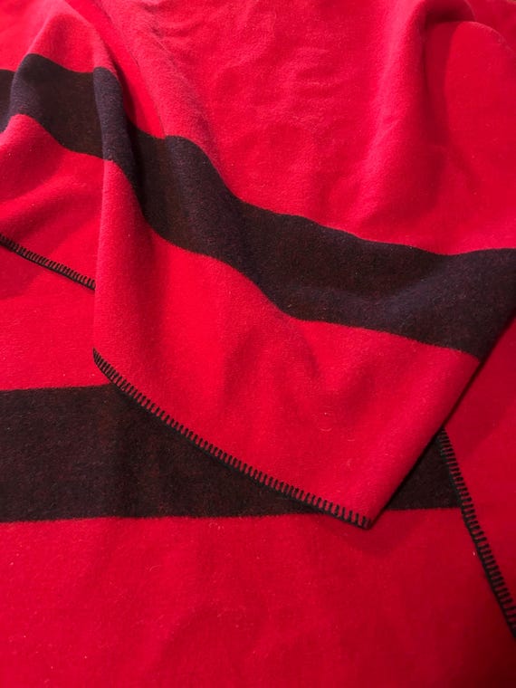 Vintage blanket in the style of Hudson Bay red and black stripe point blanket