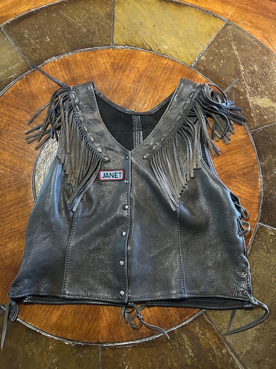 Vintage black leather womans motorcycle vest with patches