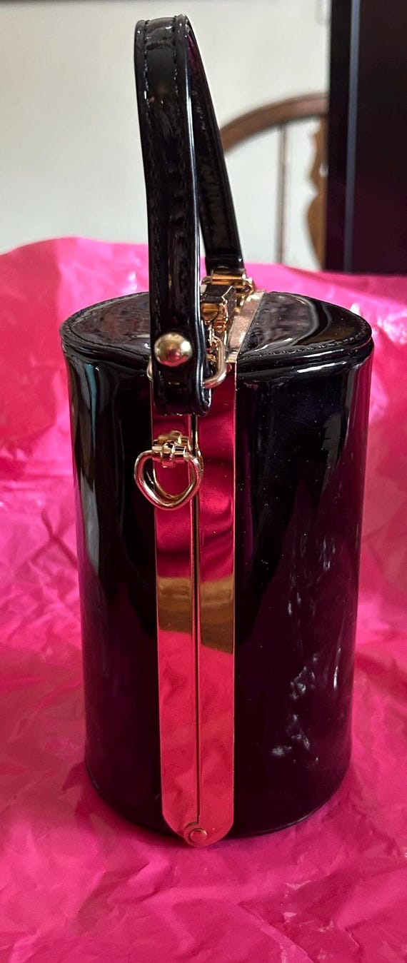Unique  top handled top closure bag black and gold