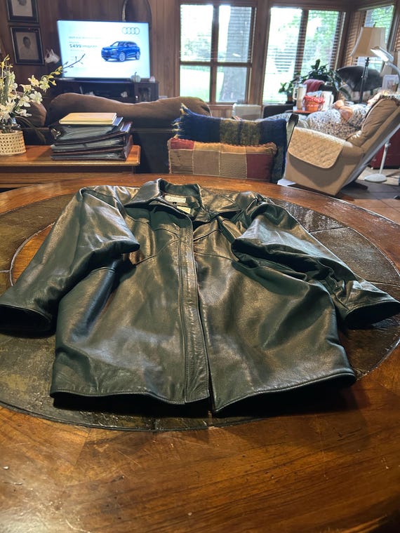 Green leather jacket size medium by Mary Dzenutis