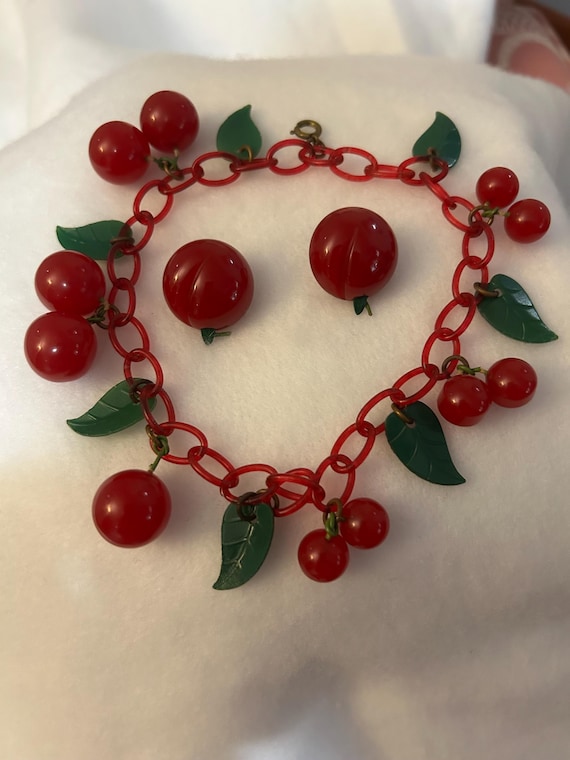 Vintage 1930's bright cherry red bakelite jewelry set of bracelet, screw back earrings