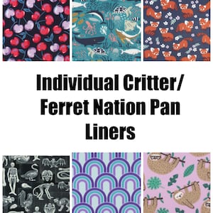 May include: Six rectangular fabric pan liners for Critter and Ferret Nation cages, featuring patterns of red and purple cherries, sea life, red pandas, animal skeletons, purple and blue concentric rainbows, and brown sloths on a light purple background.