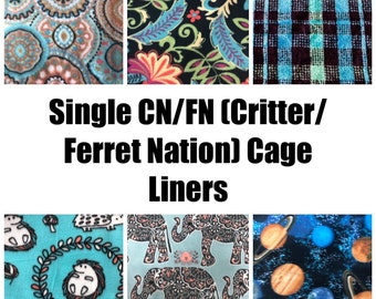 May include: Six fabric cage liners for Critter Nation or Ferret Nation cages, featuring patterns of teal circles, black floral paisley, blue plaid, hedgehogs on teal, elephants on light blue, and planets in space with the text Single CN/FN Cage Liners.