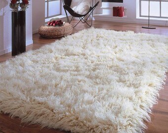 Koeckritz Half Round 8'X4' Fluffy White Shaggy Indoor Area Rug Shaggy Carpet with Premium Bound Polyester Edges. Koeckritz Half Round 8'X4' Fluffy White Shaggy Indoor Area Rug Shaggy Carpet with Premium Bound Polyester Edges.
