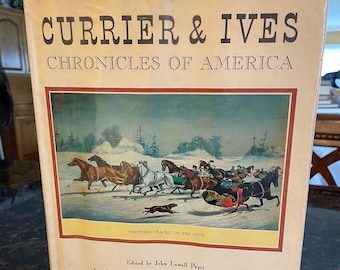 May include: A vintage book cover featuring a colorful illustration of a horse-drawn carriage racing through a snowy landscape. The title "Currier & Ives Chronicles of America" is printed in bold, black lettering. The caption "Trotting Cracks on the Snow" is printed below the illustration.