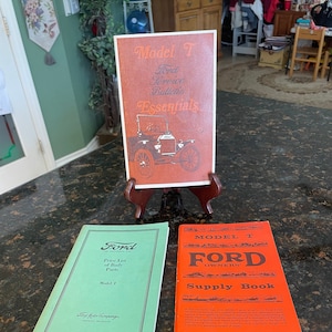 Vintage MODEL T Car Books (THREE):  Ford Service Essentials 1966;  Ford Price List Body Parts 1927;  Ford Owner Supply Book 1959