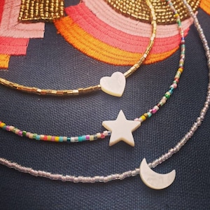 Beaded mother of pearl necklaces. Moons stars hearts