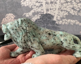 Tribal Big Cat carving in Jasper palm stone Tribal Big Cat carving in Jasper palm stone