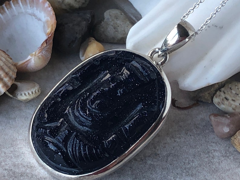 The God of all Beginings Blue Goldstone Carved Ganesha Elephant Head design 925 Sterling Silver Pendant.
