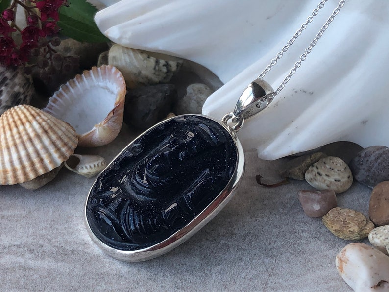 The God of all Beginings Blue Goldstone Carved Ganesha Elephant Head design 925 Sterling Silver Pendant.