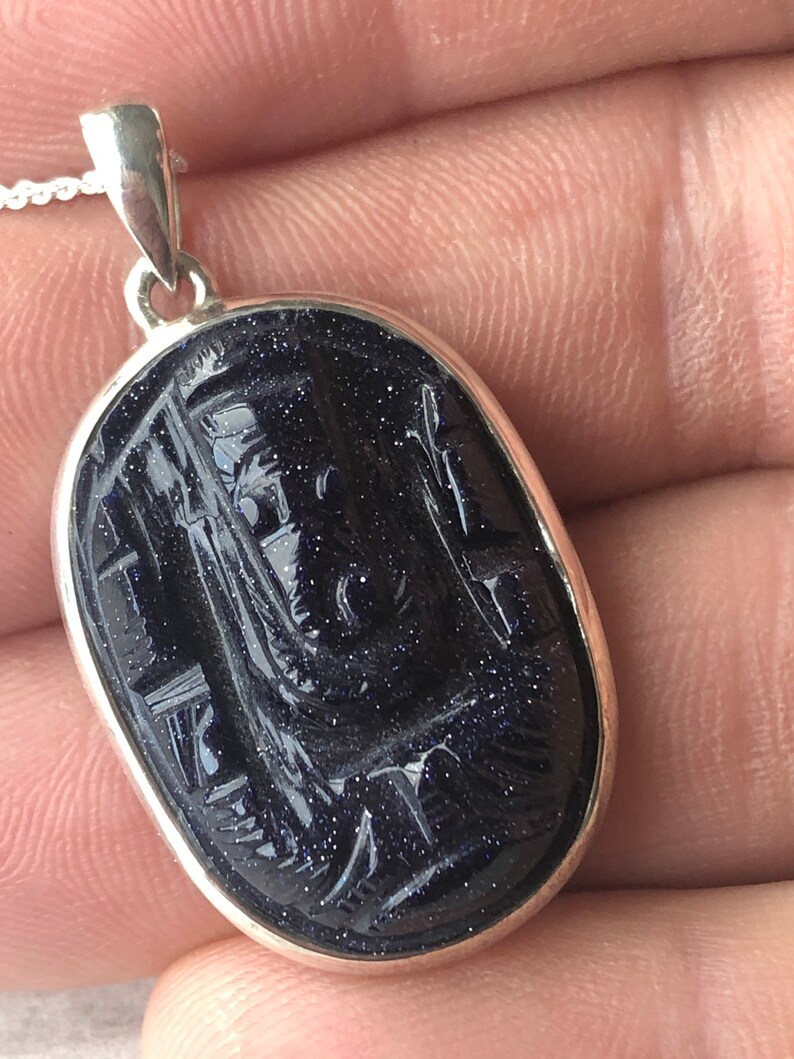 The God of all Beginings Blue Goldstone Carved Ganesha Elephant Head design 925 Sterling Silver Pendant.