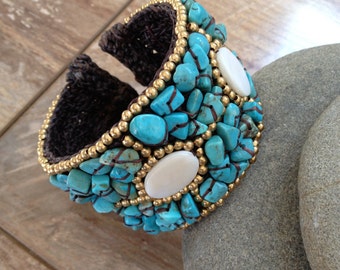 Handmade beaded bracelet with turquoise white and gold beads