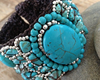 Handmade beaded bracelet with turquoise and silver stone beads