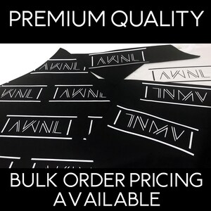May include: Black and white logo printed on black fabric with the text "PREMIUM QUALITY" and "BULK ORDER PRICING AVAILABLE".