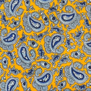 Puede incluir: Tela amarilla con un patrón paisley azul y blanco. La tela se mide con una regla en pulgadas.