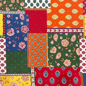 May include: A patchwork textile featuring a variety of floral and geometric patterns in a vibrant array of colors. The design incorporates squares of red, blue, green, orange, and yellow, each with unique floral or paisley motifs. The overall effect is a colorful and detailed fabric.