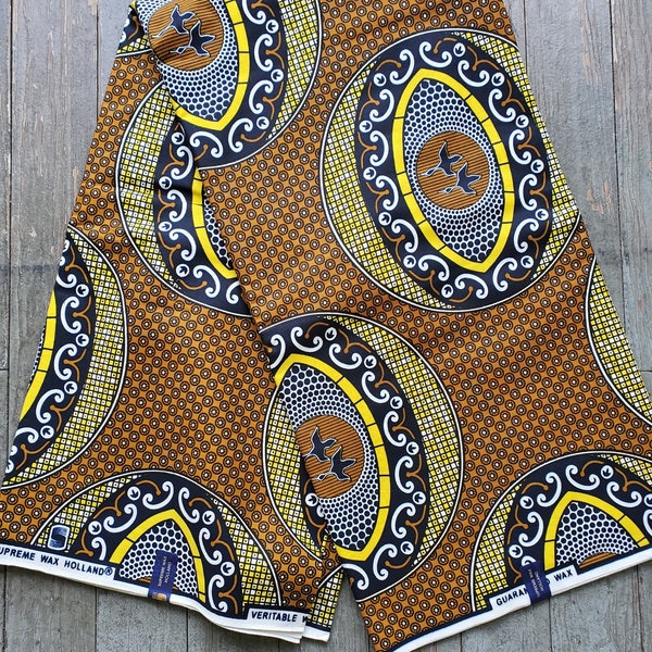 Brown and Yellow Supreme Wax Ankara Cotton Fabric with Birds sold by the yard or the 6-yd piece