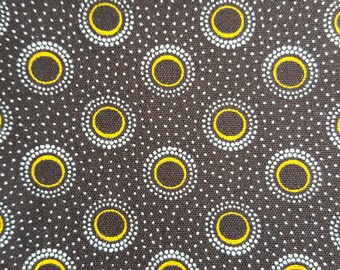 3 Cats brown and gold eclipse pattern shweshwe fabric from South Africa priced by the HALF meter