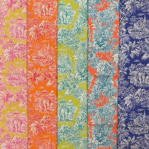 May include: Five vertical fabric swatches featuring a repeating toile pattern of elephants, palm trees, and architectural structures. The color combinations include pink on yellow, red on orange, teal on lime green, teal on orange, and white on blue.