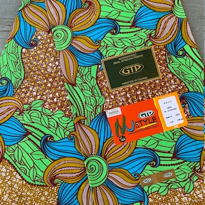 GTP Nustyle green, blue, and cool yellow printed fabric sold by the yard