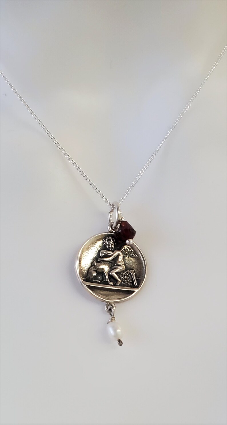 Sterling Silver Angel Cherub Pendant 17 mm with Sterling Silver Chain 16 Garnet and pearl drop