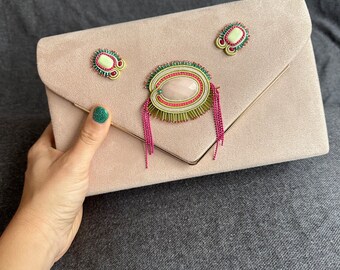 Pink handbag with chain and soutache appliqué. Envelope-shaped party clutch with natural stones. Bags with embroidered appliqué.