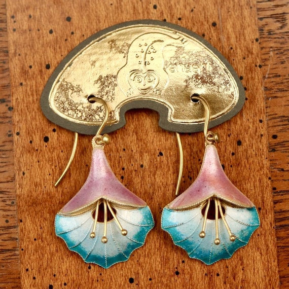 Trumpet earrings store