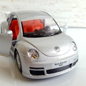 Volkswagen Beetle RSi , metal model car in Deep Silver color! Lovely collectible item!