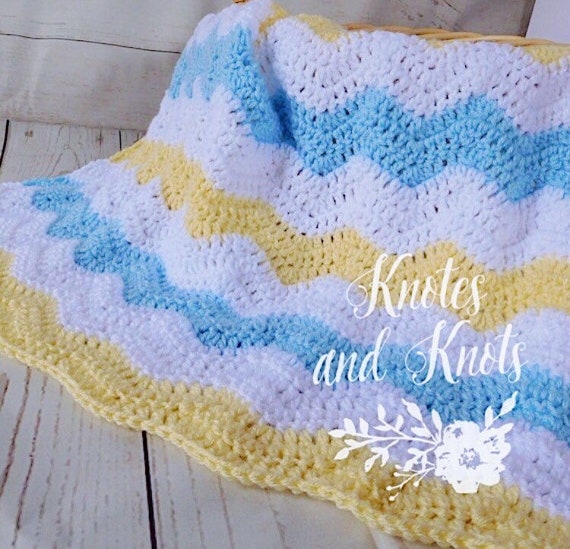 white crochet baby blanket