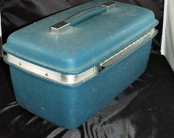 Vintage Samsonite Saturn-treinkoffer blauw met make-upblad en