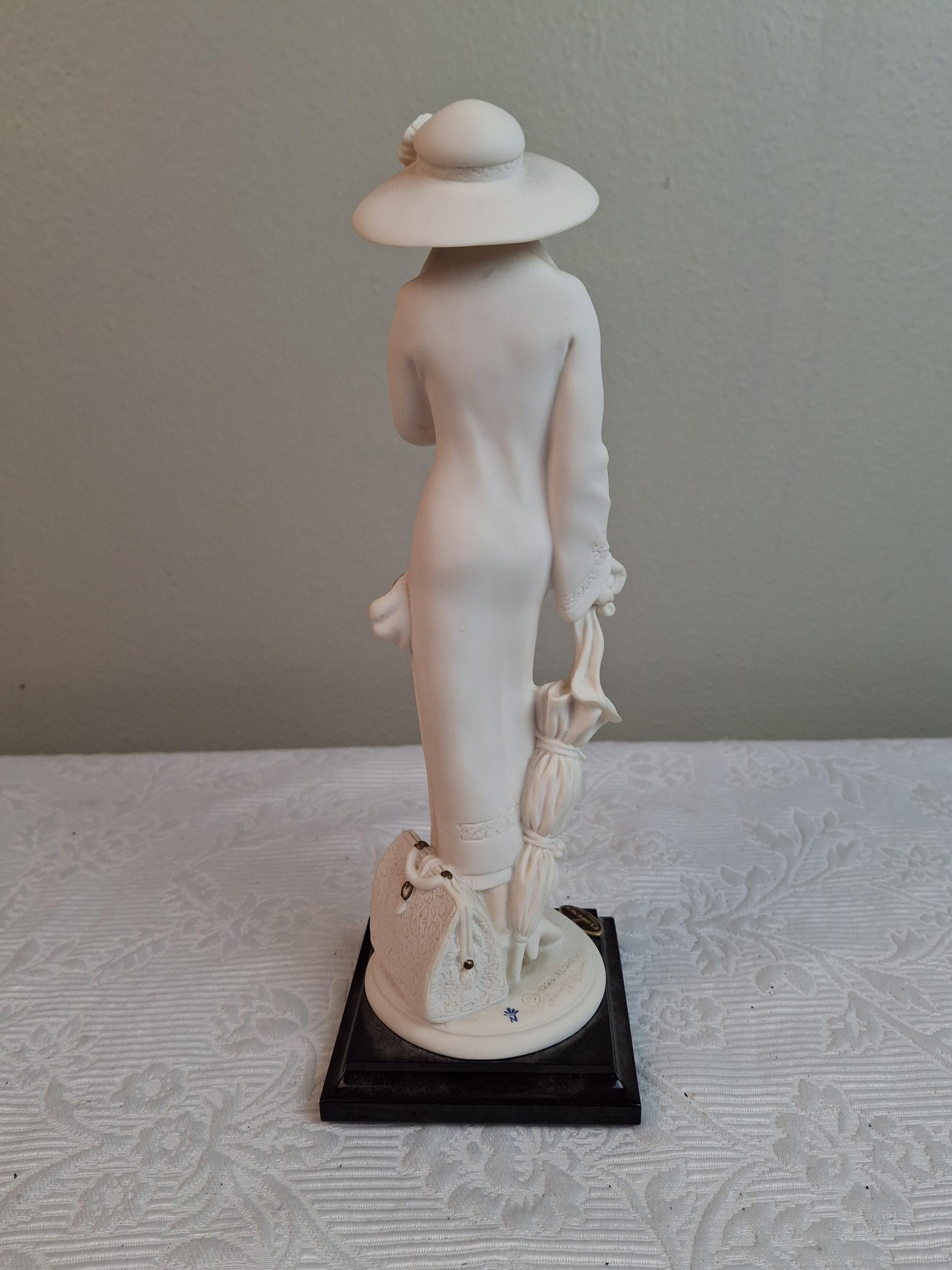 1998 年製ジュゼッペ アルマーニのヴィンテージ フィギュア「RAINE